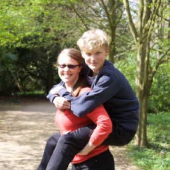 That's right, I can carry this giant teenager ;)